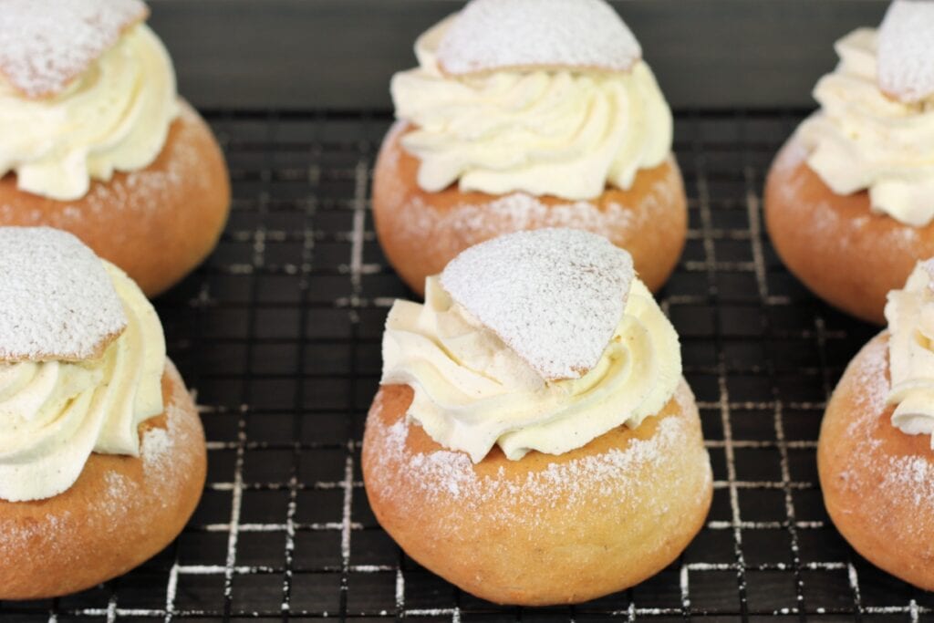 Semlor on a rack, the typical Scandinavian pastry